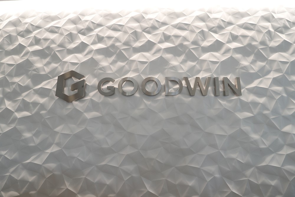 Goodwin logo on wall image Goodwin logo on wall
